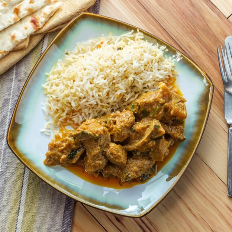 Trinidad curry goat with green seasoning and rich curry gravy